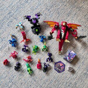 17 Assorted Bakugan Figures (Large & Small) + Collector Cards & Magnetic Discs